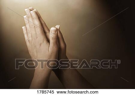 Stock Photography - Praying hands. Fotosearch