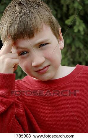 Stock Photo - Puzzled boy. Fotosearch