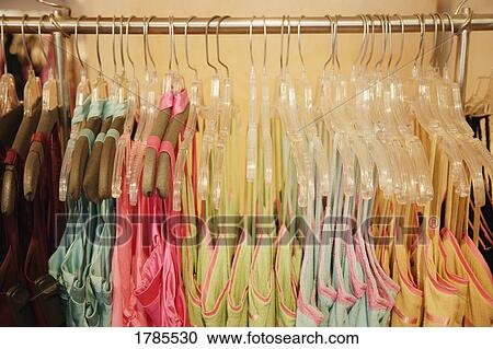 Rack of clothes View Large Photo Image Stock Image - Rack of clothes. Fotosearch