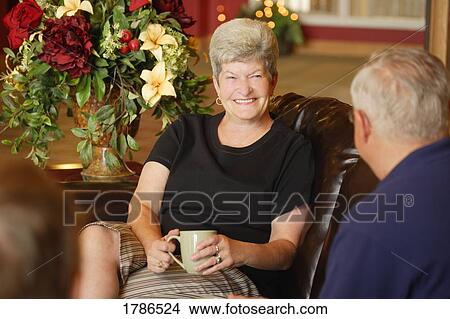 Picture - Seniors having coffee together. Fotosearch