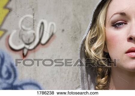 Stock Photo - Serious young woman. Fotosearch