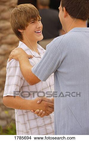 Picture - Shaking hands. Fotosearch