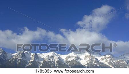Snow capped mountains View Large Photo Image Stock Photography - Snow capped mountains. Fotosearch