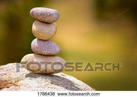 Stock Photo - Stones balanced in a stack. Fotosearch