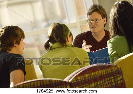 Teacher teaching students View Large Photo Image Stock Photography - Teacher teaching students. Fotosearch