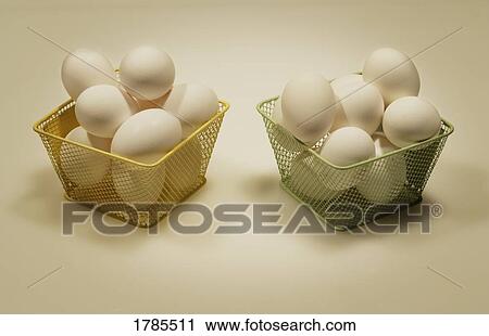 Stock Image - Two baskets of eggs. Fotosearch