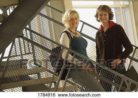 Two students together View Large Photo Image Stock Photograph - Two students together. Fotosearch
