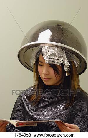 Waiting for hair color to develop View Large Photo Image Stock Photo - Waiting for hair color to develop. Fotosearch