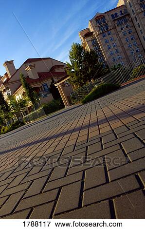 Brick road and building exteriors View Large Photo Image Stock Photo - Brick road and building exteriors. Fotosearch