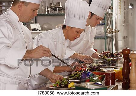 Stock Photo - Chef's in the kitchen. Fotosearch