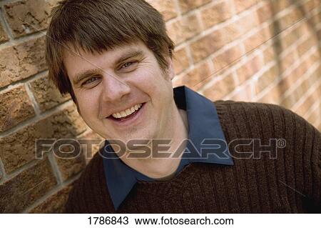 Stock Image - Closeup of man laughing. Fotosearch