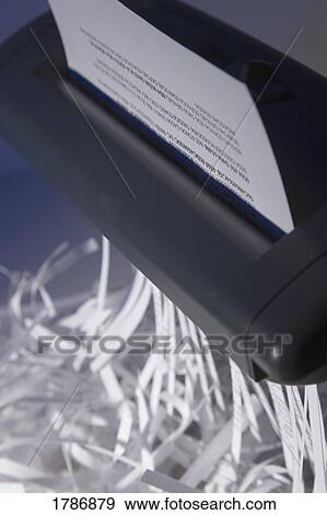 Closeup of paper shredder View Large Photo Image Stock Photo - Closeup of paper shredder. Fotosearch