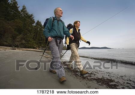 Stock Photo - Couple on hike. Fotosearch