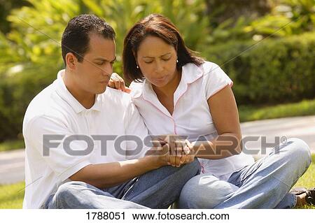 Couple praying together View Large Photo Image Stock Image - Couple praying together. Fotosearch