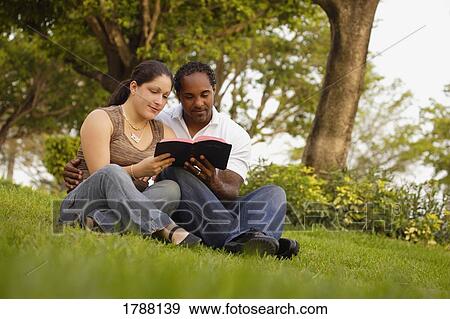 Couple reading the Bible View Large Photo Image Stock Photo - Couple reading the Bible. Fotosearch