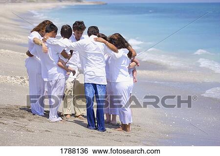 Stock Photograph - Family worship. Fotosearch