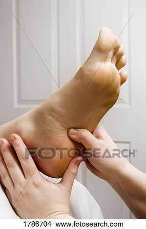 Foot massage View Large Photo Image Picture - Foot massage. Fotosearch
