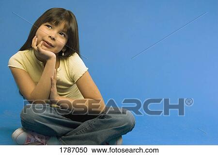 Stock Image - Girl sitting. Fotosearch