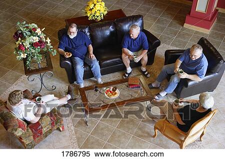 Stock Photography - Group of seniors visiting. Fotosearch