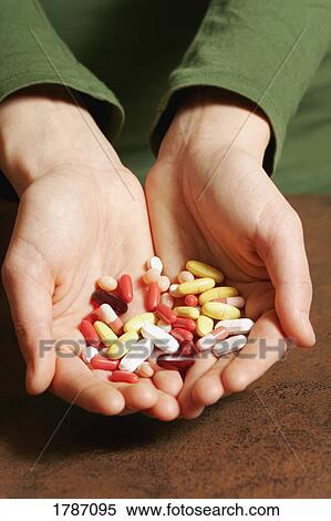 Hands full of pills View Large Photo Image Stock Photography - Hands full of pills. Fotosearch