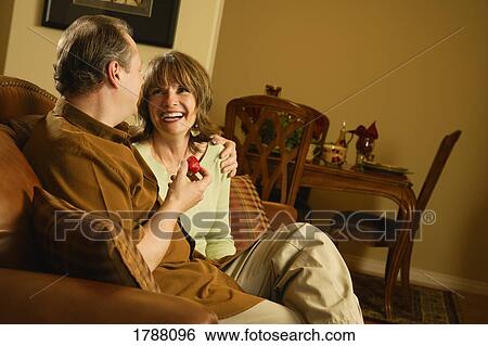 Happy middle-aged couple View Large Photo Image Stock Photograph - Happy middle-aged couple. Fotosearch