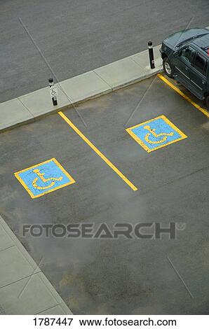 Stock Photo - High-angle handicapped parking. Fotosearch