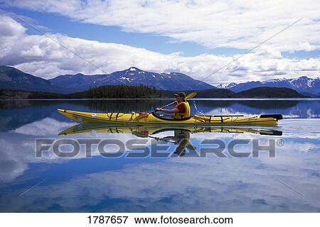 Kayak touring, Atlin Lake View Large Photo Image Stock Photo - Kayak touring, Atlin Lake. Fotosearch