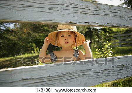 Little boy with straw hat View Large Photo Image Stock Image - Little boy with straw hat. Fotosearch