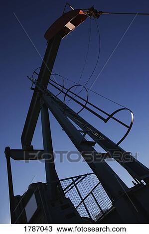 Stock Image - Low-angle oil pump. Fotosearch