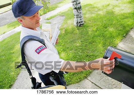 Stock Photograph - Mail carrier at work. Fotosearch