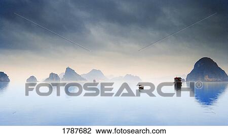 Overcast Morning on Halong Bay, Vietnam View Large Photo Image Stock Image - Overcast Morning on Halong Bay, Vietnam. Fotosearch