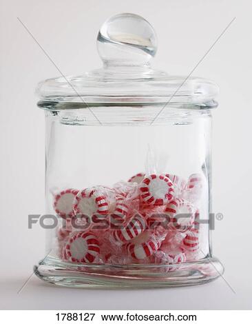 Peppermint candies in glass jar View Large Photo Image Stock Photo - Peppermint candies in glass jar. Fotosearch