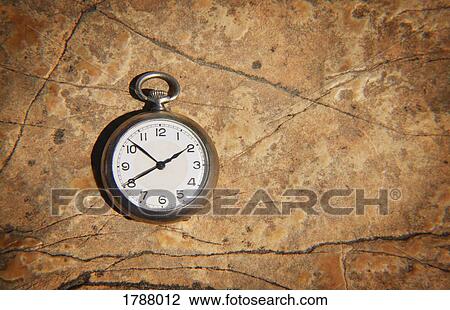 Pocket watch on textured background View Large Photo Image Stock Image - Pocket watch on textured background. Fotosearch