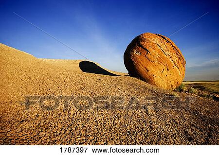 Stock Photo - Red rock boulder. Fotosearch