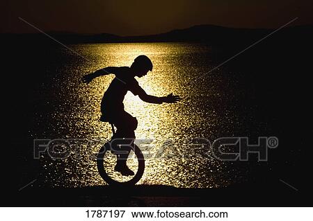 Silhouette of unicycle View Large Photo Image Stock Photo - Silhouette of unicycle. Fotosearch