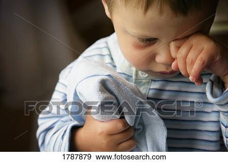 Sleepy little boy View Large Photo Image Stock Photo - Sleepy little boy. Fotosearch