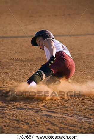 Sliding baseball player View Large Photo Image Stock Photo - Sliding baseball player. Fotosearch