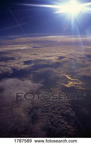 Sunburst ariel view of clouds View Large Photo Image Stock Photo - Sunburst ariel view of clouds. Fotosearch