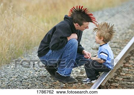Two boys with mohawk hairdos View Large Photo Image Stock Image - Two boys with mohawk hairdos. Fotosearch