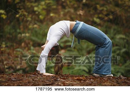 Stock Photography - Woman doing yoga. Fotosearch