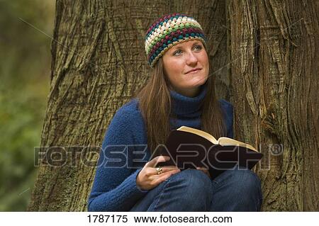 Stock Photography - Woman with book. Fotosearch