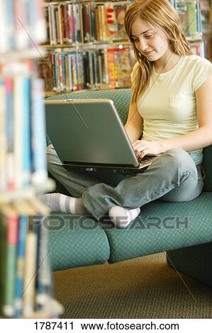 Working on a laptop computer View Large Photo Image Stock Image - Working on a laptop computer. Fotosearch