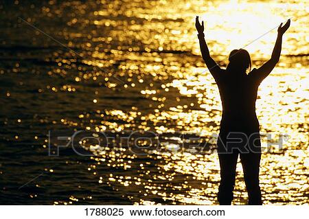 Stock Photography - Worshipping out of doors. Fotosearch