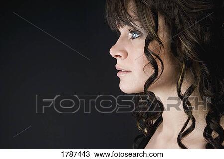 Stock Image - Young woman profile. Fotosearch
