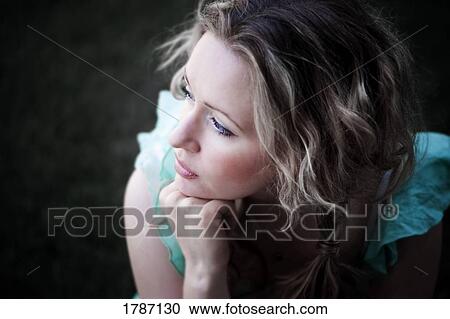 Young woman thinking View Large Photo Image Stock Image - Young woman thinking. Fotosearch