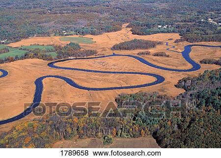 Aerial view of winding river View Large Photo Image Stock Photo - Aerial view of winding river. Fotosearch