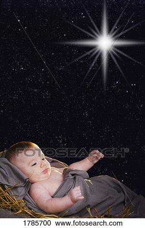 Baby Jesus in the manger View Large Photo Image Stock Image - Baby Jesus in the manger. Fotosearch