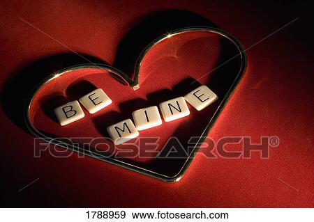 Be mine spelled inside heart View Large Photo Image Stock Photo - Be mine spelled inside heart. Fotosearch