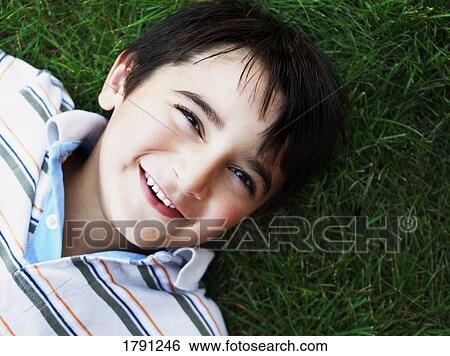 Stock Photograph - Boy smiling. Fotosearch