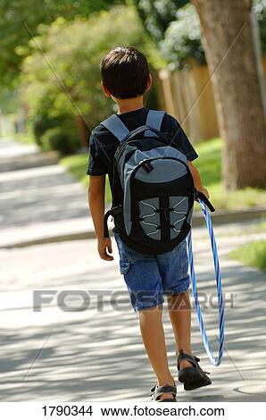 Boy with hula hoop View Large Photo Image Picture - Boy with hula hoop. Fotosearch